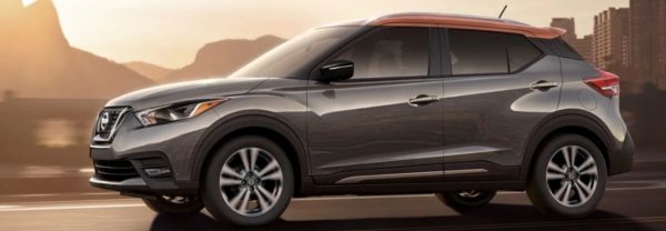 2019 nissan kicks driving at sunset